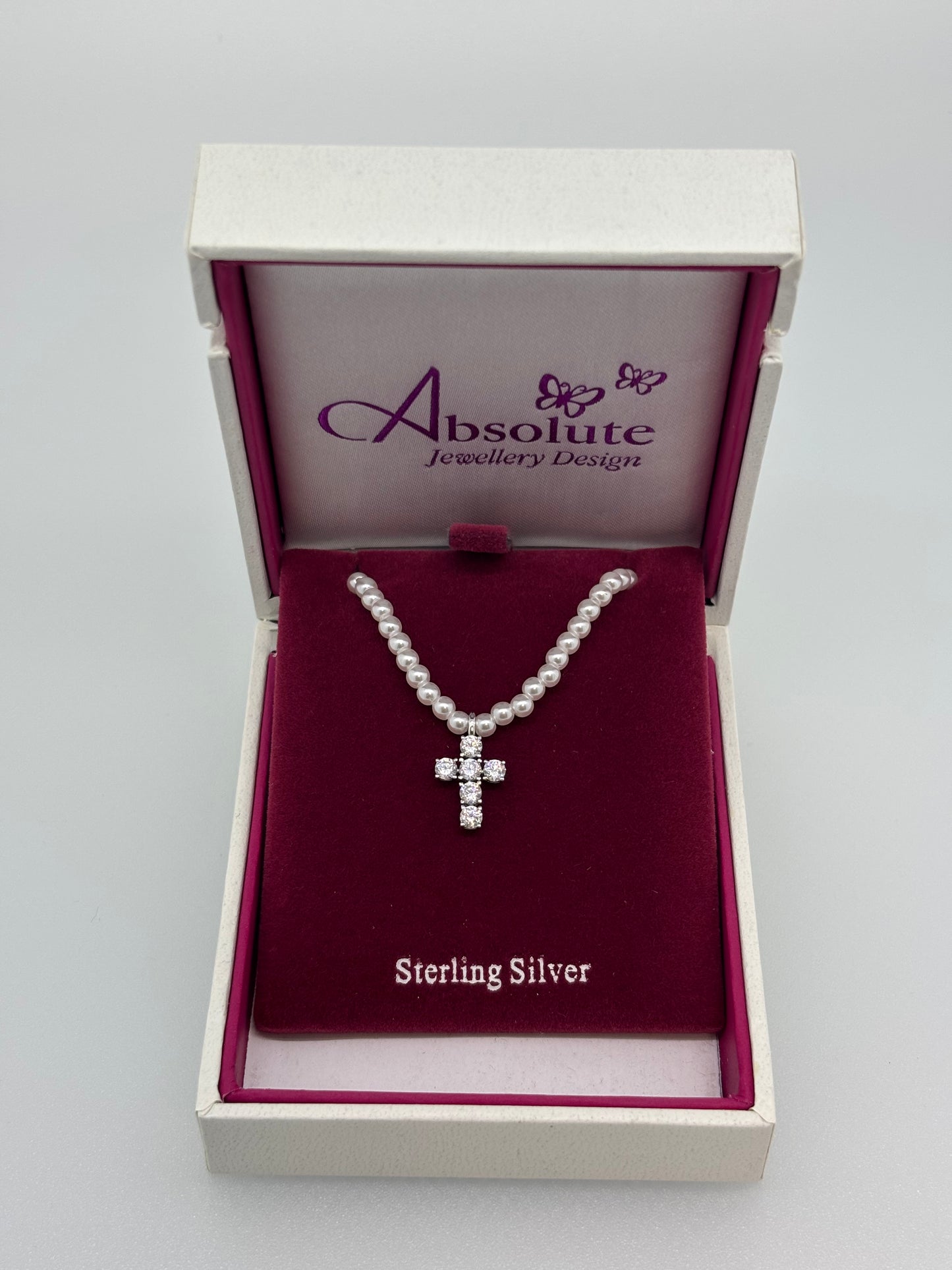 Children’s pearl necklace with cross pendant / cz stones