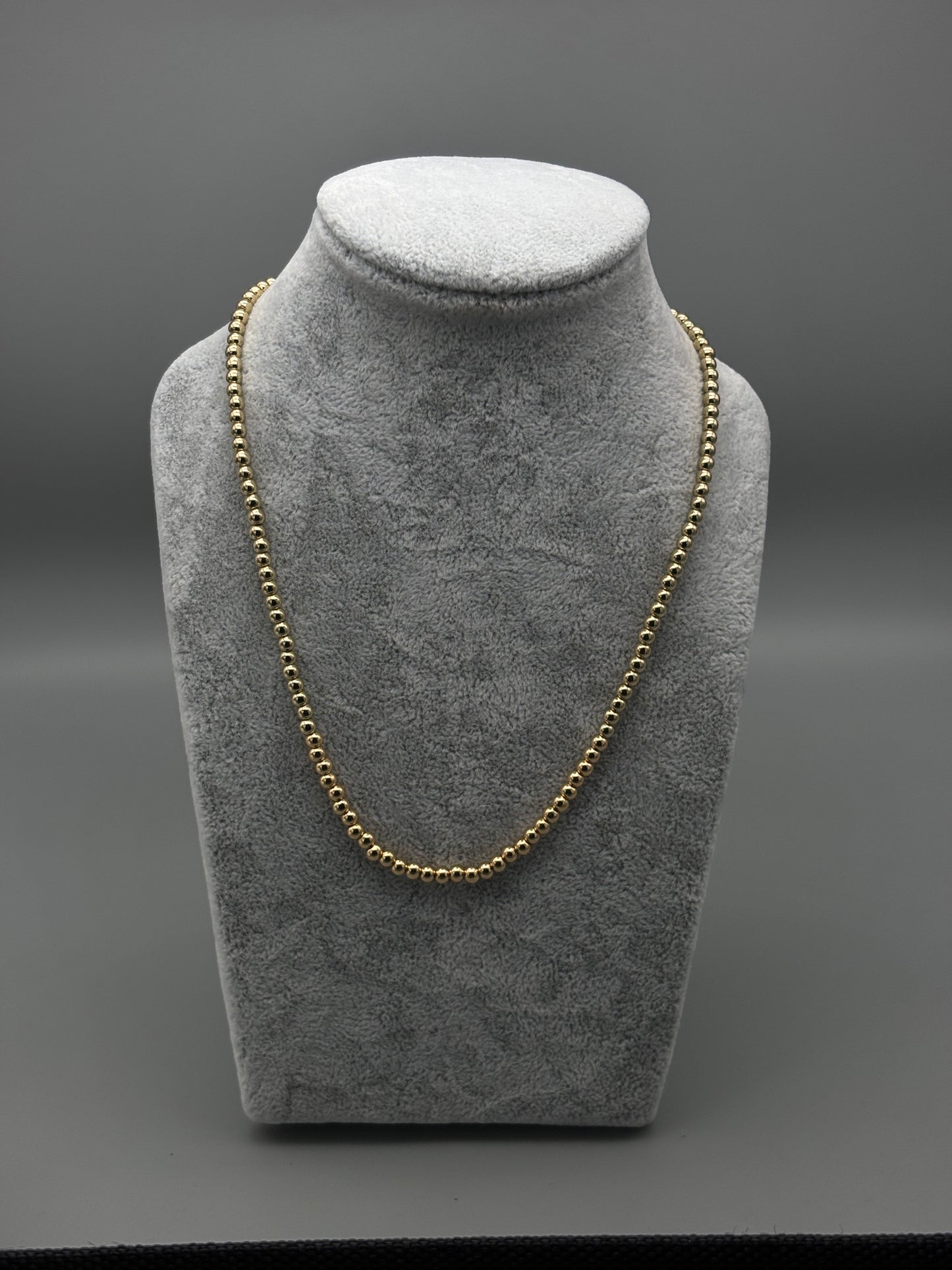 Absolute gold bead necklace