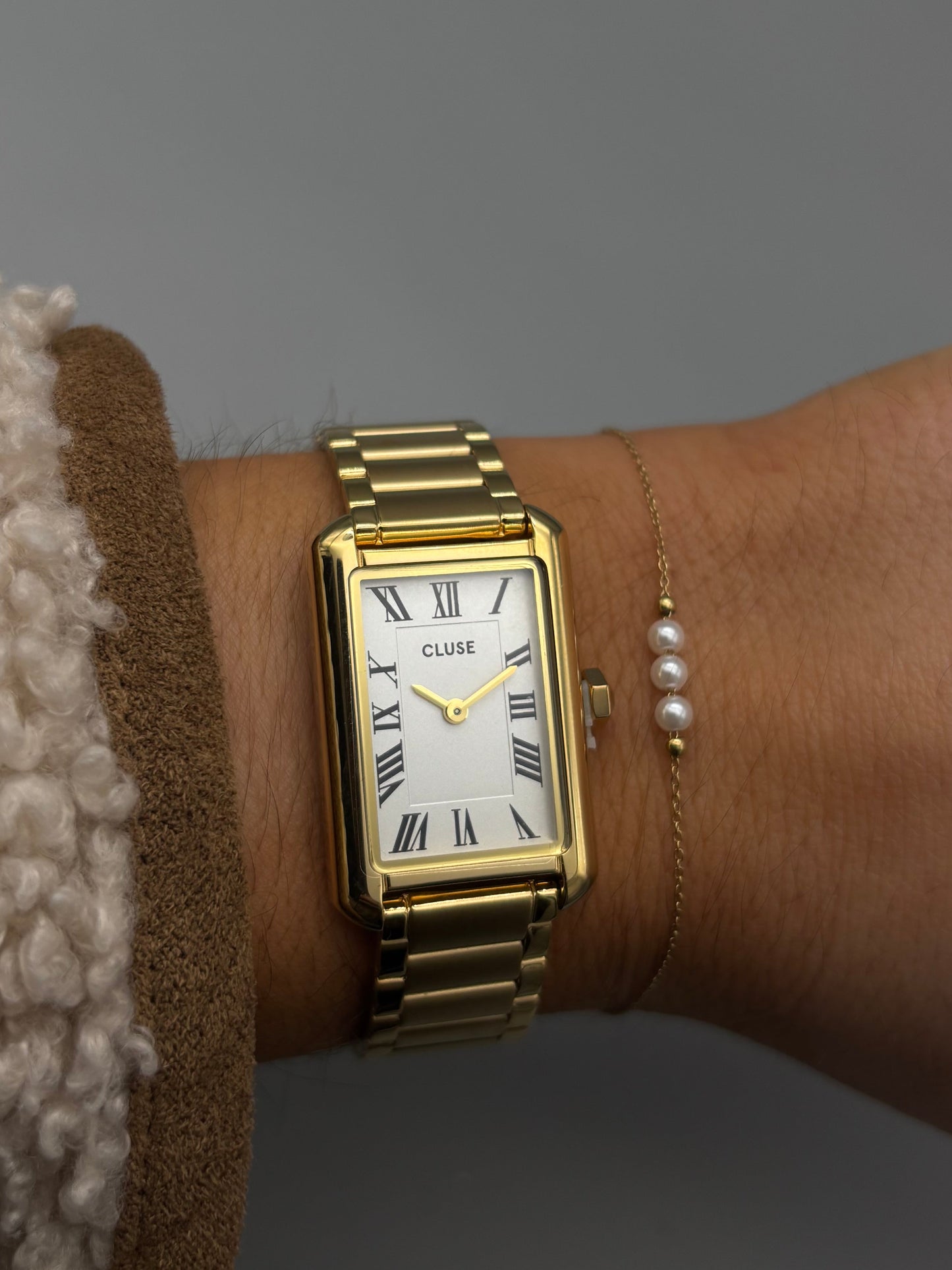 CLUSE ladies gold watch and bracelet set