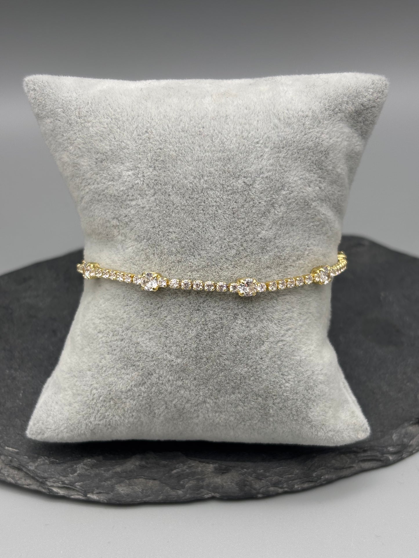 Absolute tennis style bracelet with cubic zirconia stones