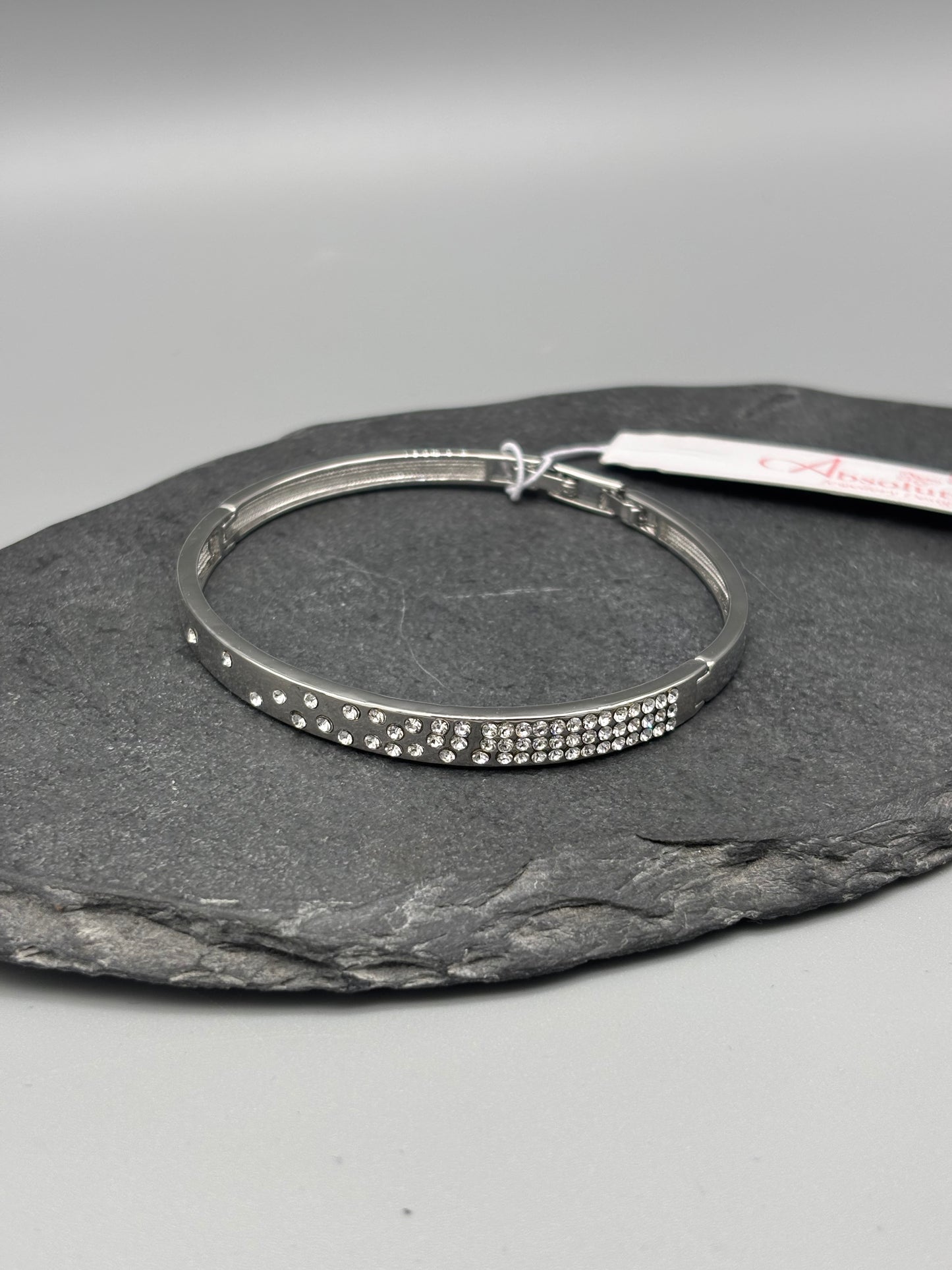 Absolute silver bangle with inset cubic zirconia stones