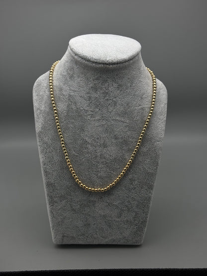 Absolute gold bead necklace