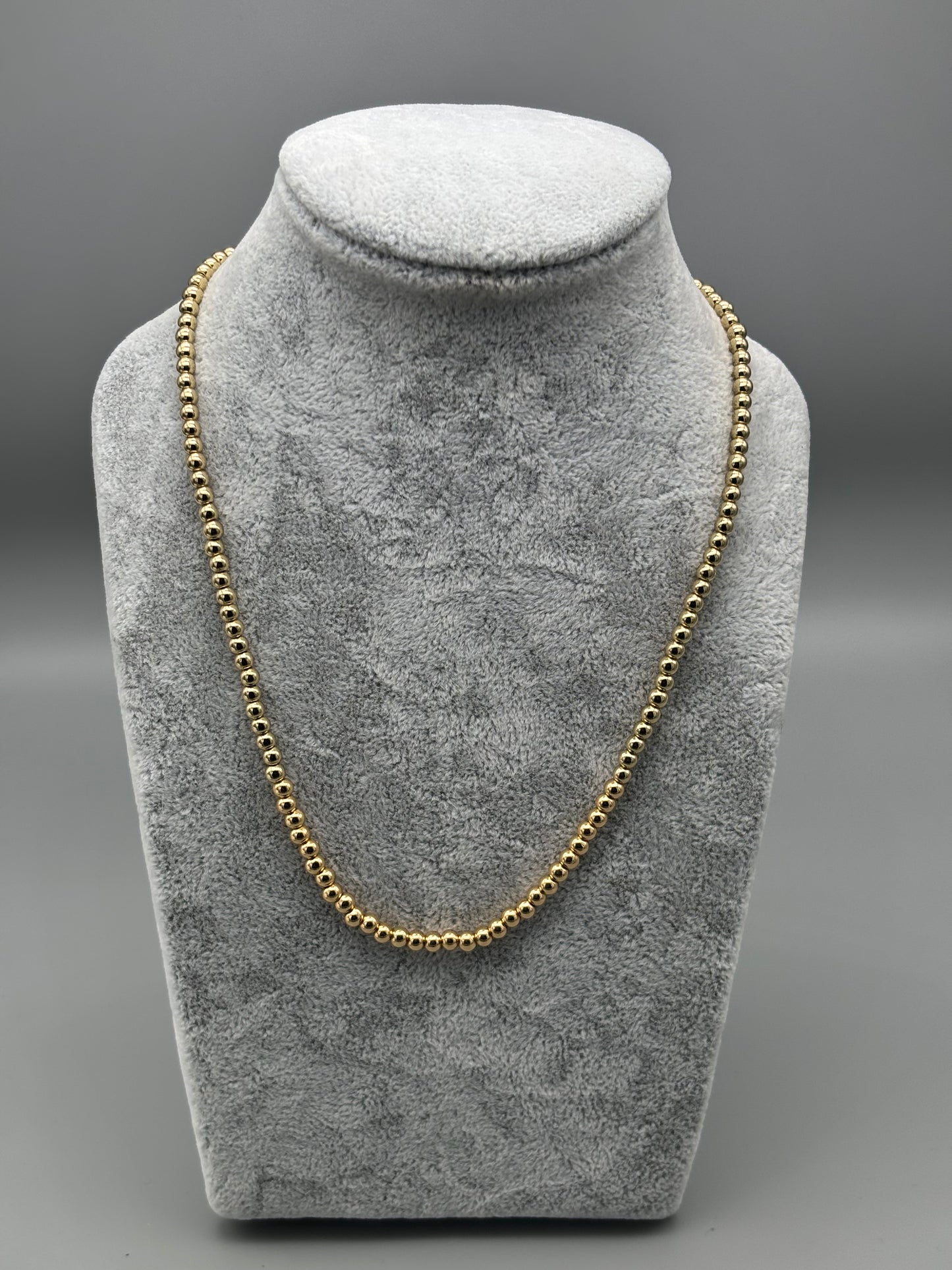 Absolute gold bead necklace