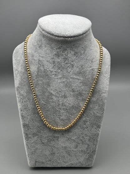 Absolute gold bead necklace