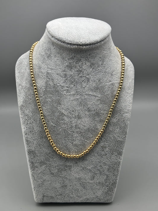 Absolute gold bead necklace