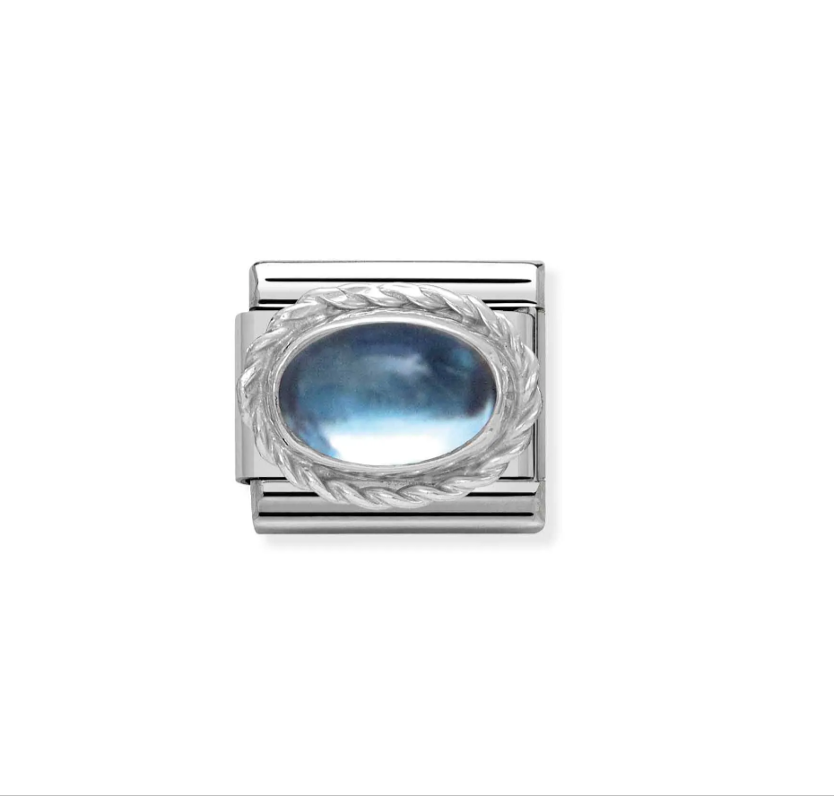Nomimation silver oval blue topaz