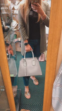 Load and play video in Gallery viewer, Red Cuckoo Silver Tote bag with Tassels

