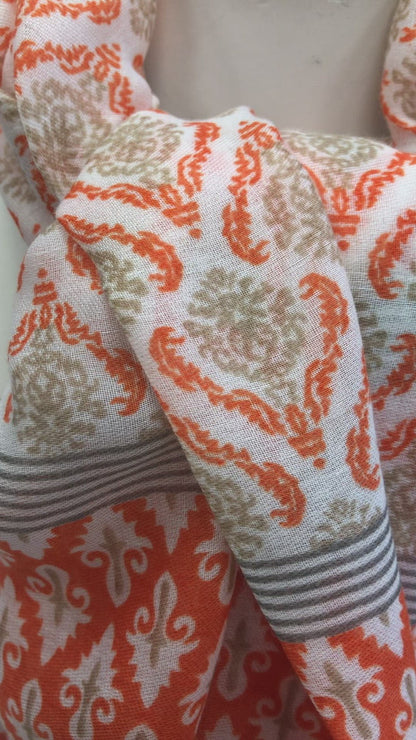 Stylish Orange Envy scarf with tassels